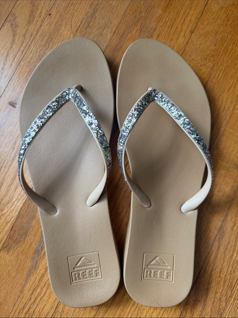 Reef Women’s Tan Flip Flops with Multicolor Glitter Straps